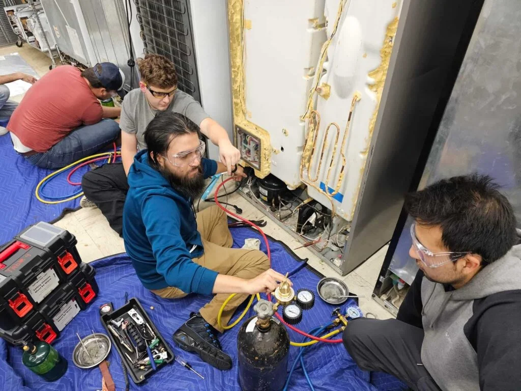 ApexFix professional refrigerator repair technician in Dubai